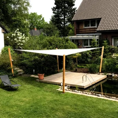 Sicheres Sonnensegel über Spielbereich im Garten