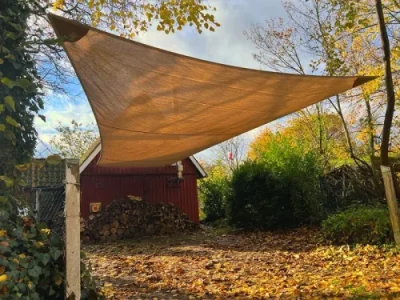 Sonnensegel für Gartenterrasse mit gemütlicher Sitzecke